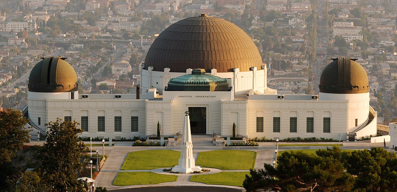 Griffith Observatory on the hillside overlooking the Los Angeles skyline